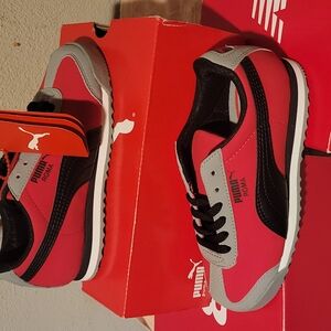 Puma Pink and Black Sneakers for Active Style